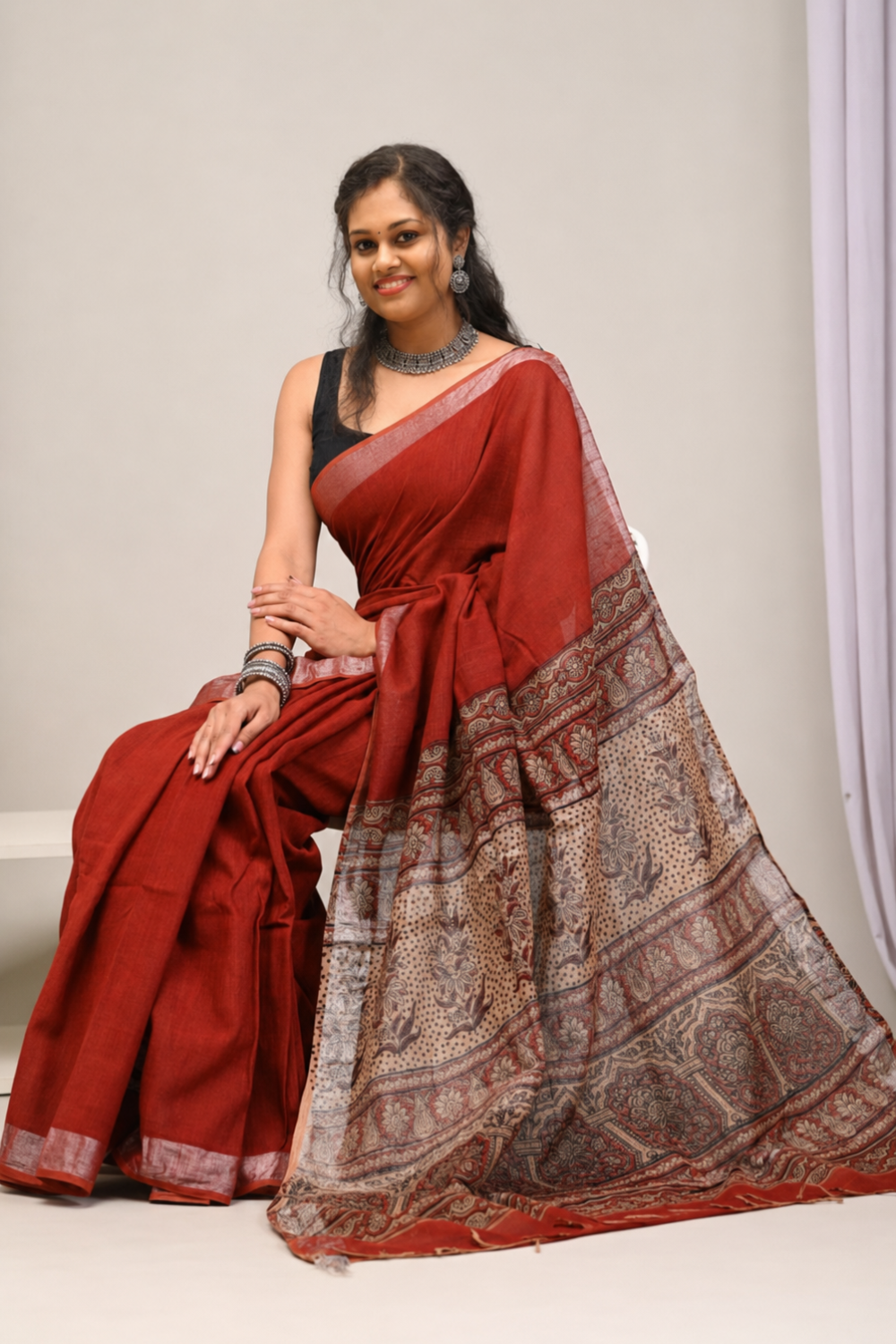 Rust Red Linen Saree with Printed Kalamkari-Inspired Pallu