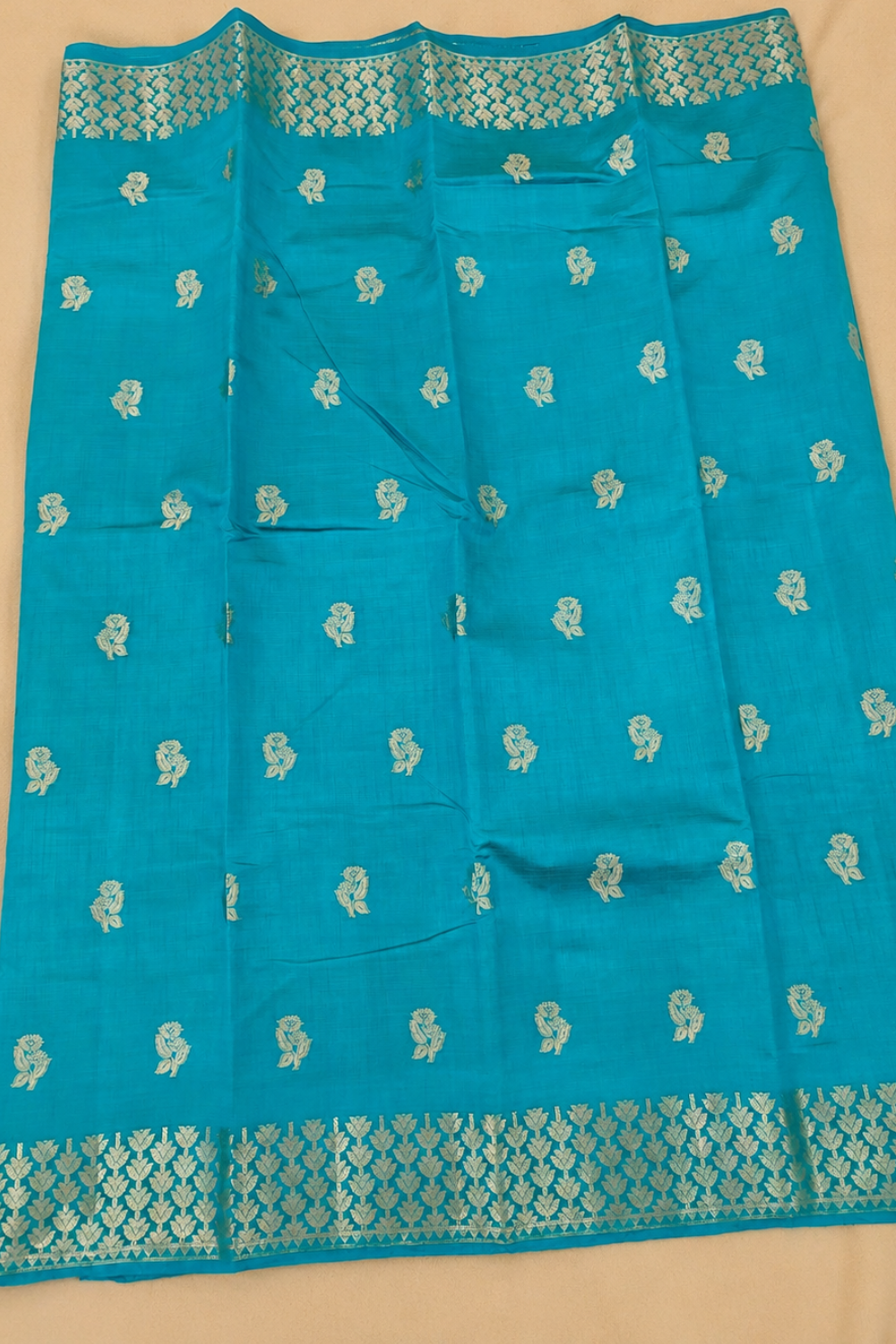 Teal Blue Tussar Saree with Zari Floral Buttas and Elegant Woven Border
