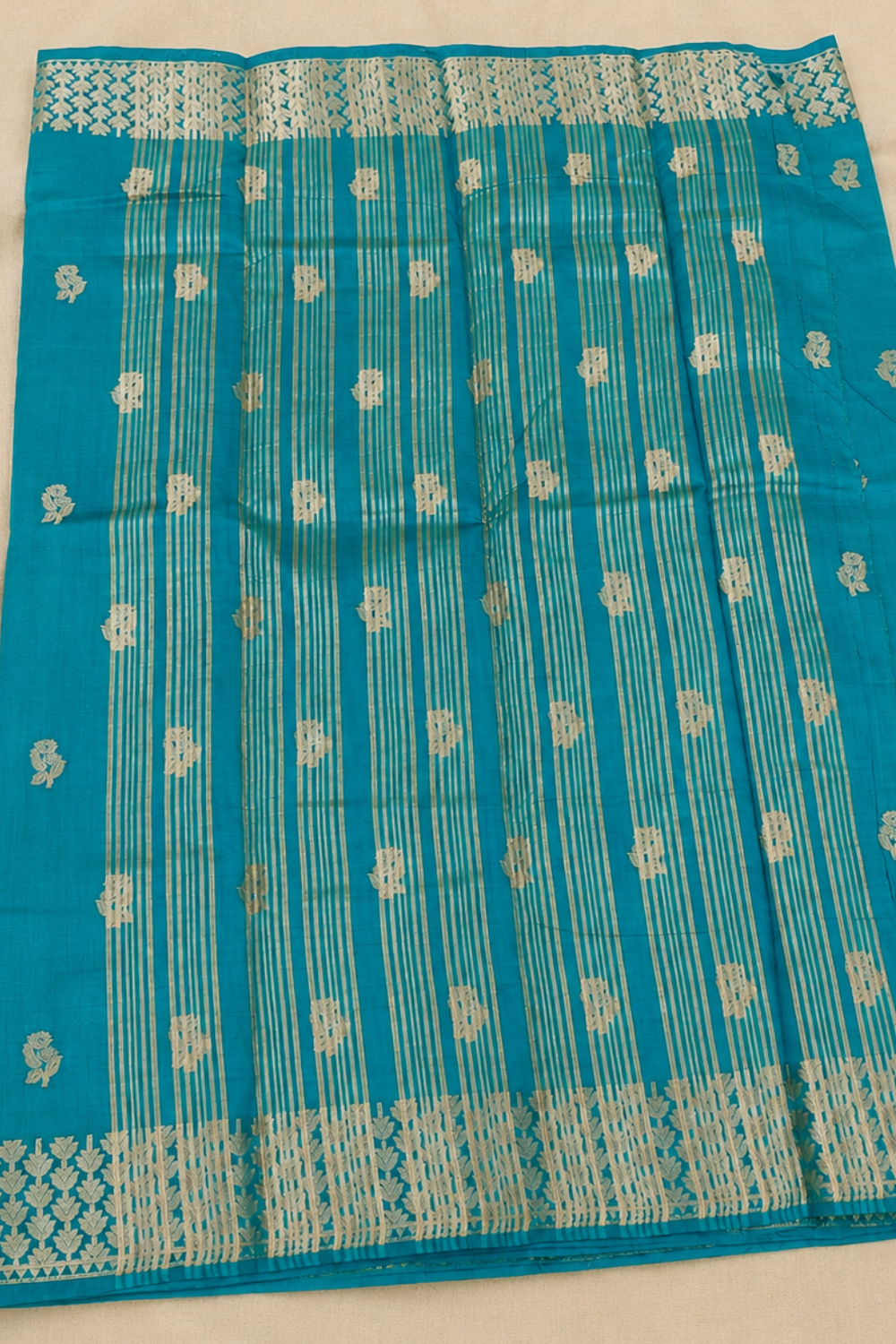 Teal Blue Tussar Saree with Zari Floral Buttas and Elegant Woven Border