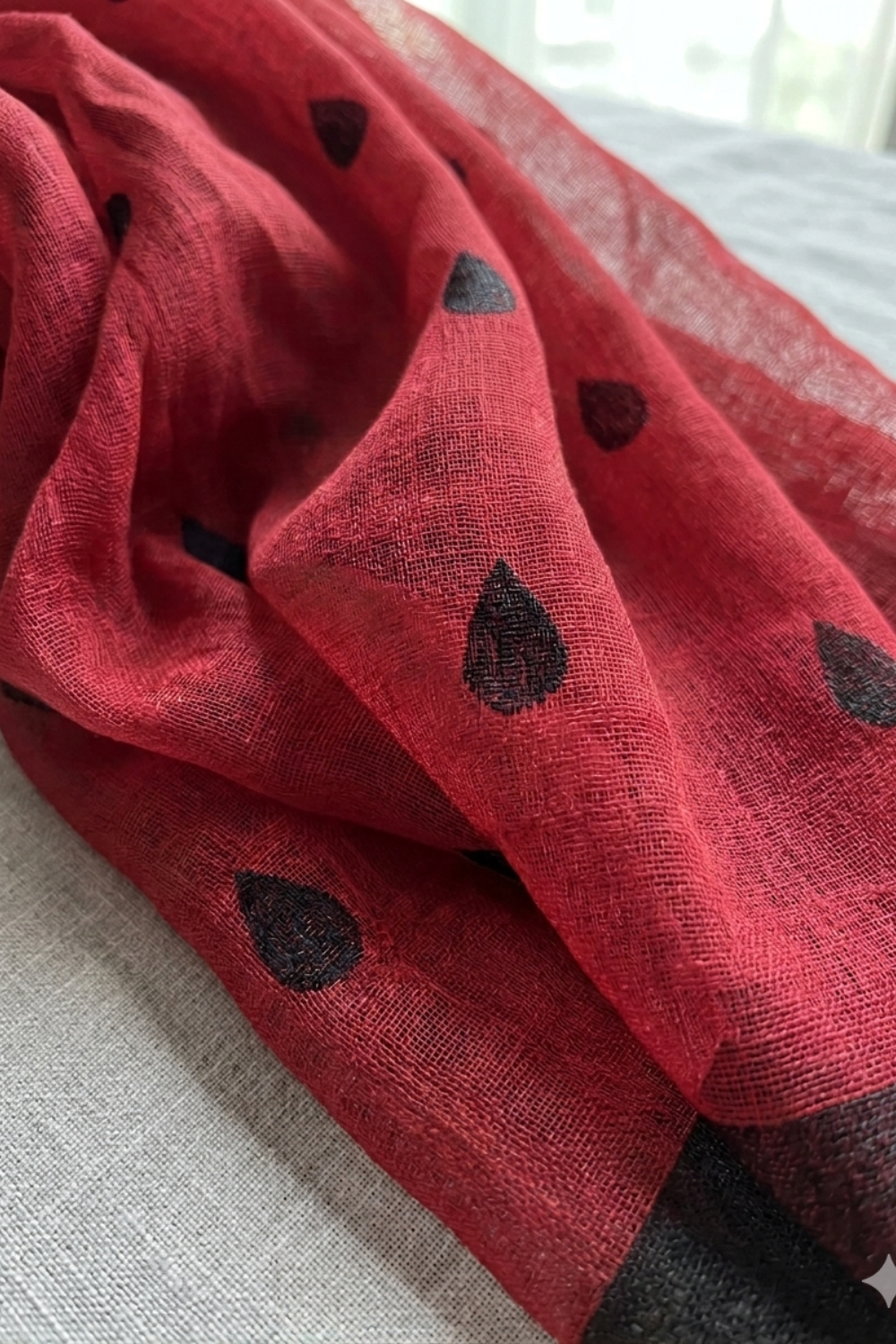 Crimson Red Linen Blend Saree with Black Drop Motifs