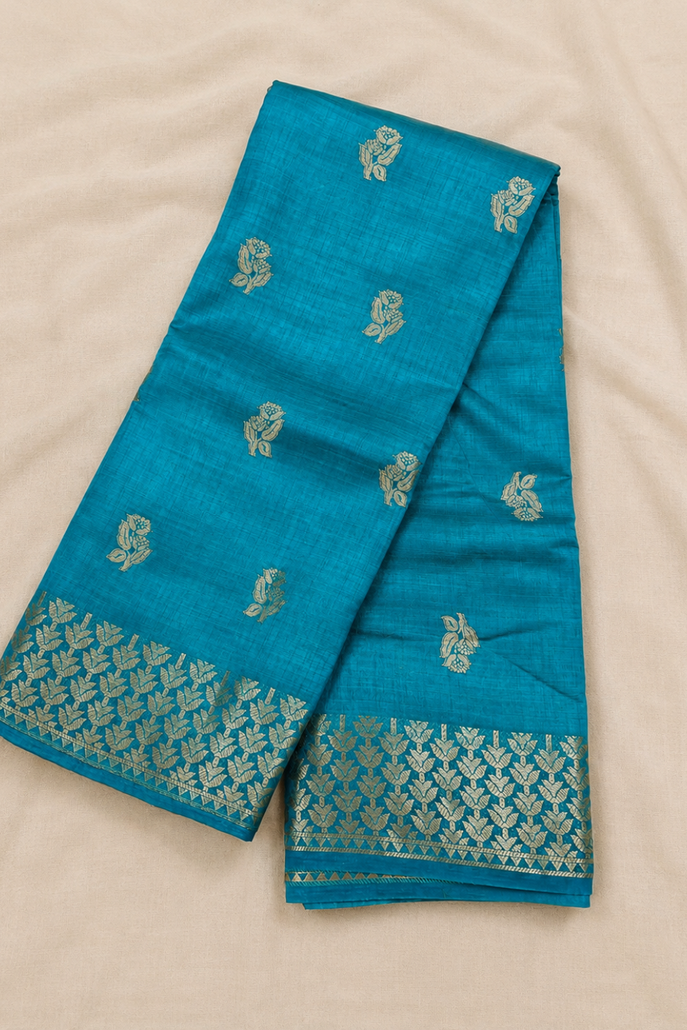 Teal Blue Tussar Saree with Zari Floral Buttas and Elegant Woven Border