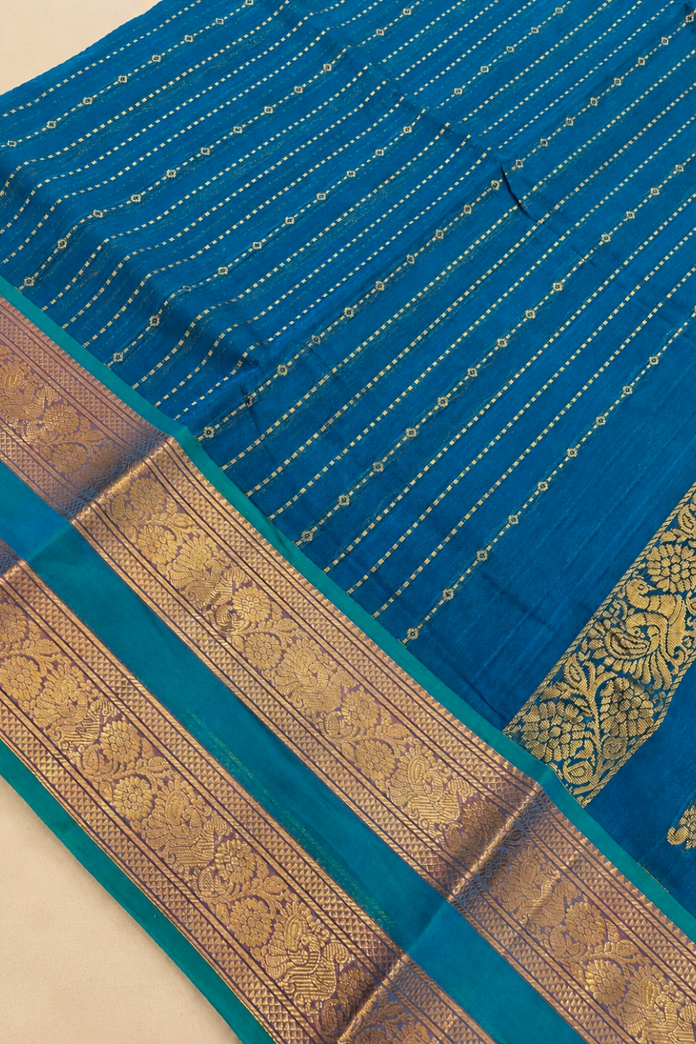 Peacock Blue Chettinad Cotton Saree with Rich Gold Zari Border & Floral Motifs