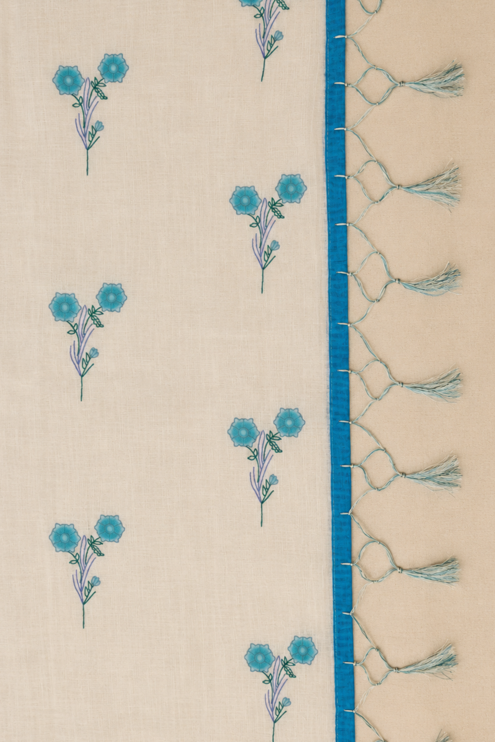 Ivory Linen Blend Saree with Blue Floral Prints and Contrast Blue & White Checked Floral Blouse