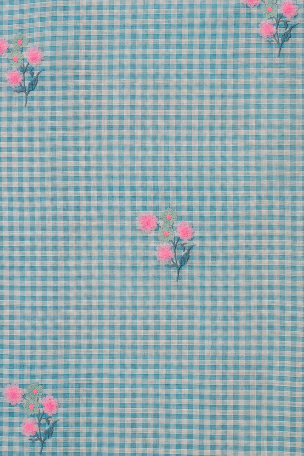 Ivory Linen Blend Saree with Blue Floral Prints and Contrast Blue & White Checked Floral Blouse