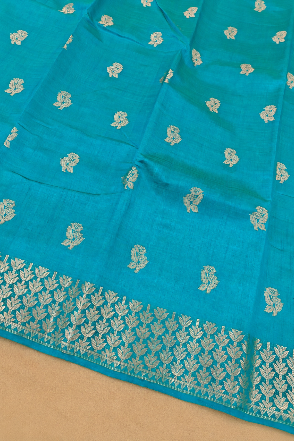 Teal Blue Tussar Saree with Zari Floral Buttas and Elegant Woven Border
