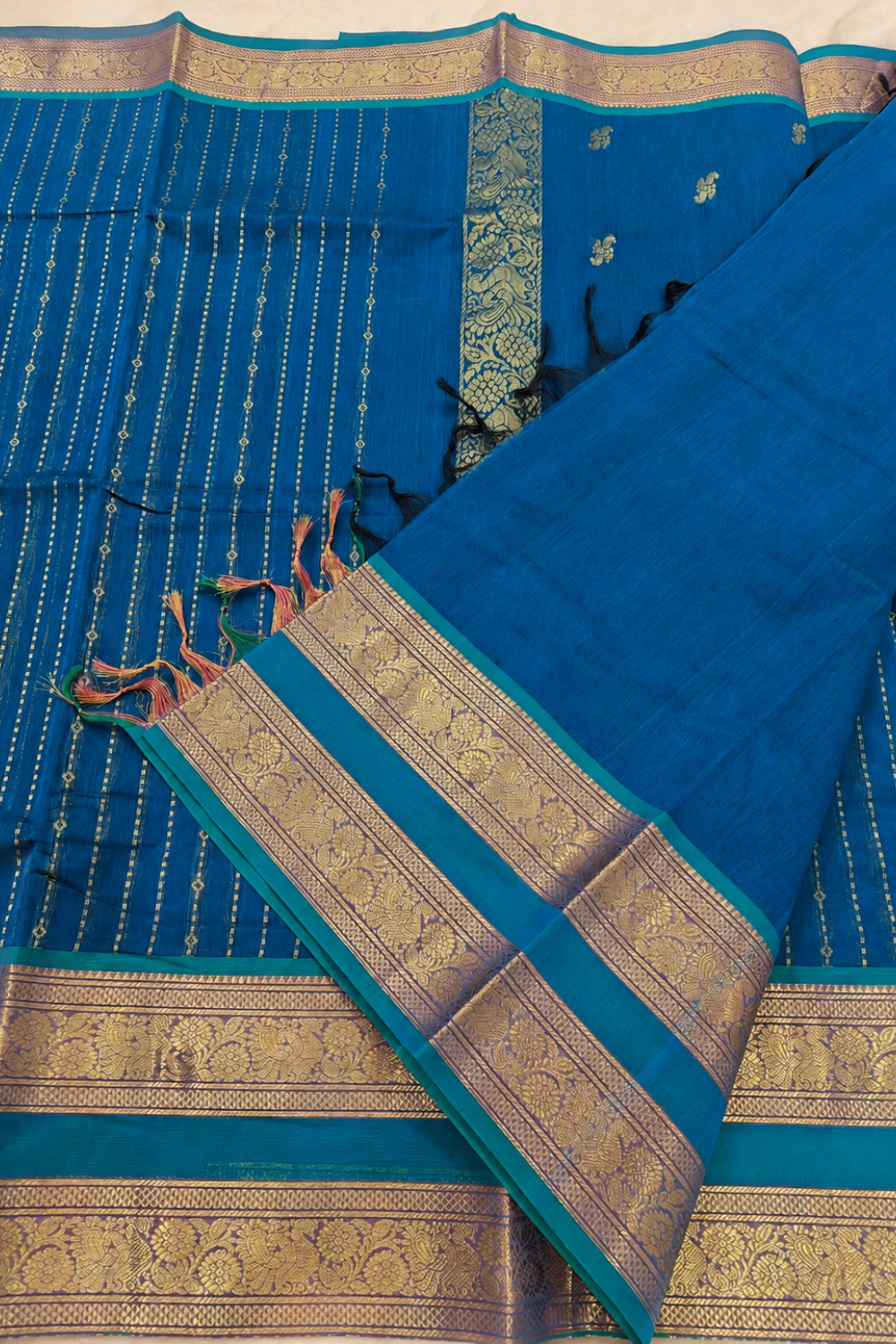 Peacock Blue Chettinad Cotton Saree with Rich Gold Zari Border & Floral Motifs